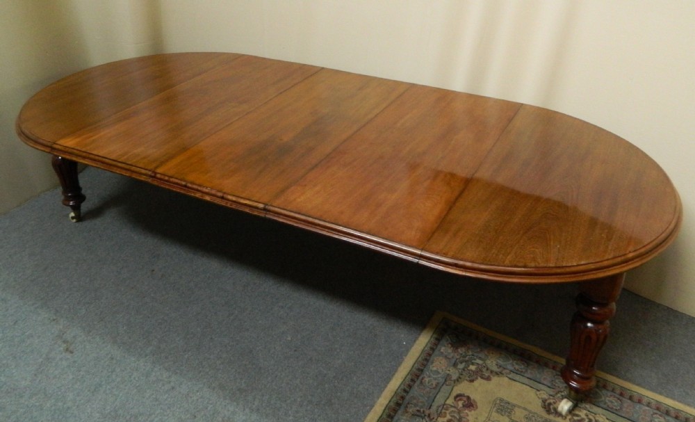 large mahogany extending dining table