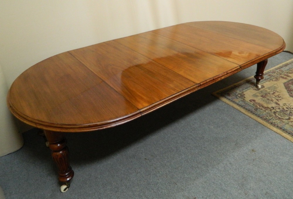 large mahogany extending dining table View VII