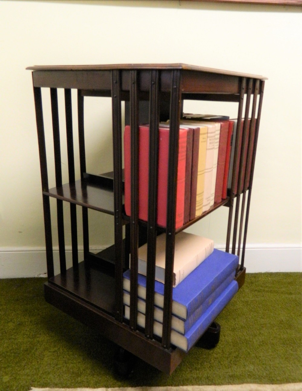 inlaid revolving bookcase View II
