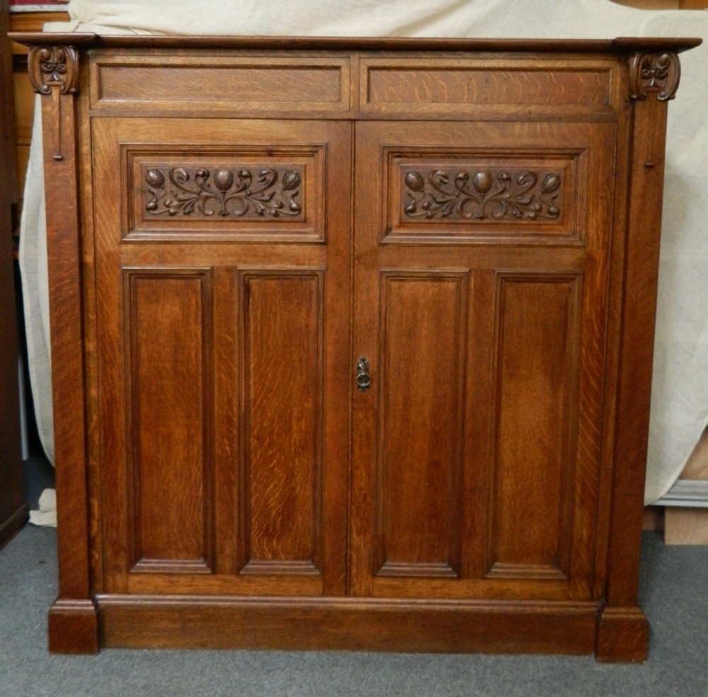 Arts & Crafts oak press cupboard
