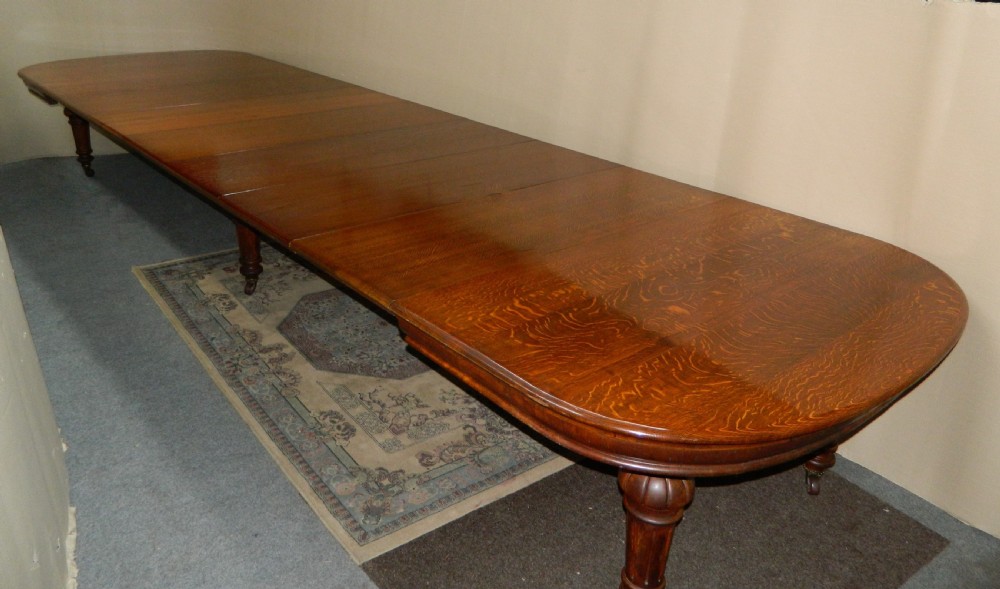 18' extending oak dining table with 7 leaves