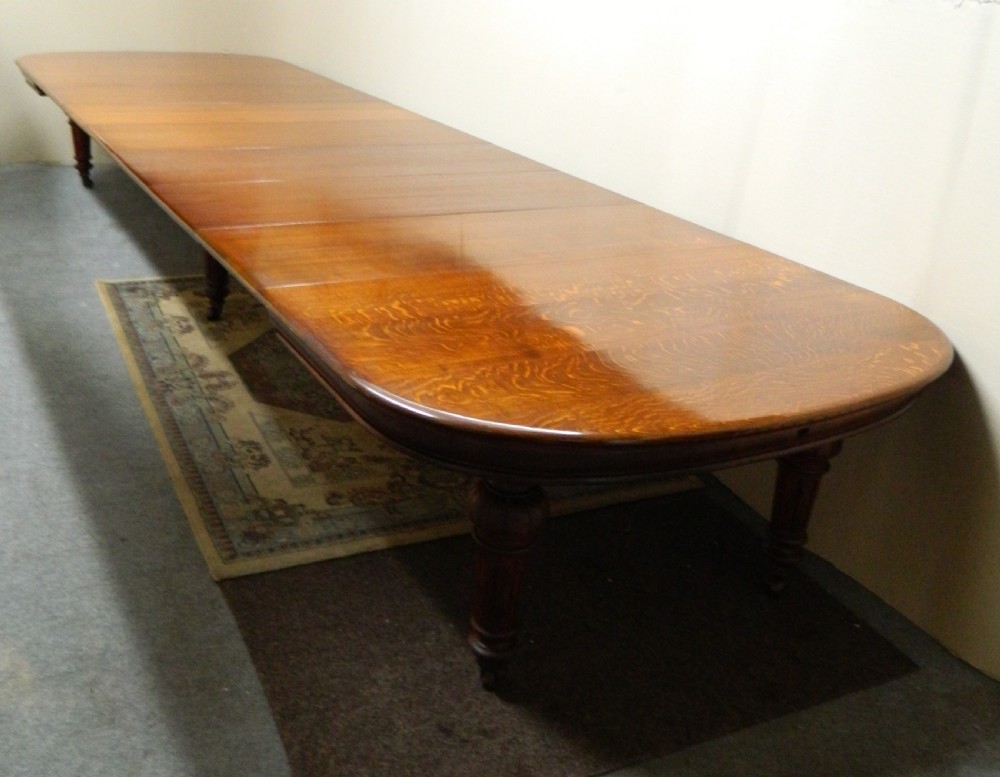 18' extending oak dining table with 7 leaves View II
