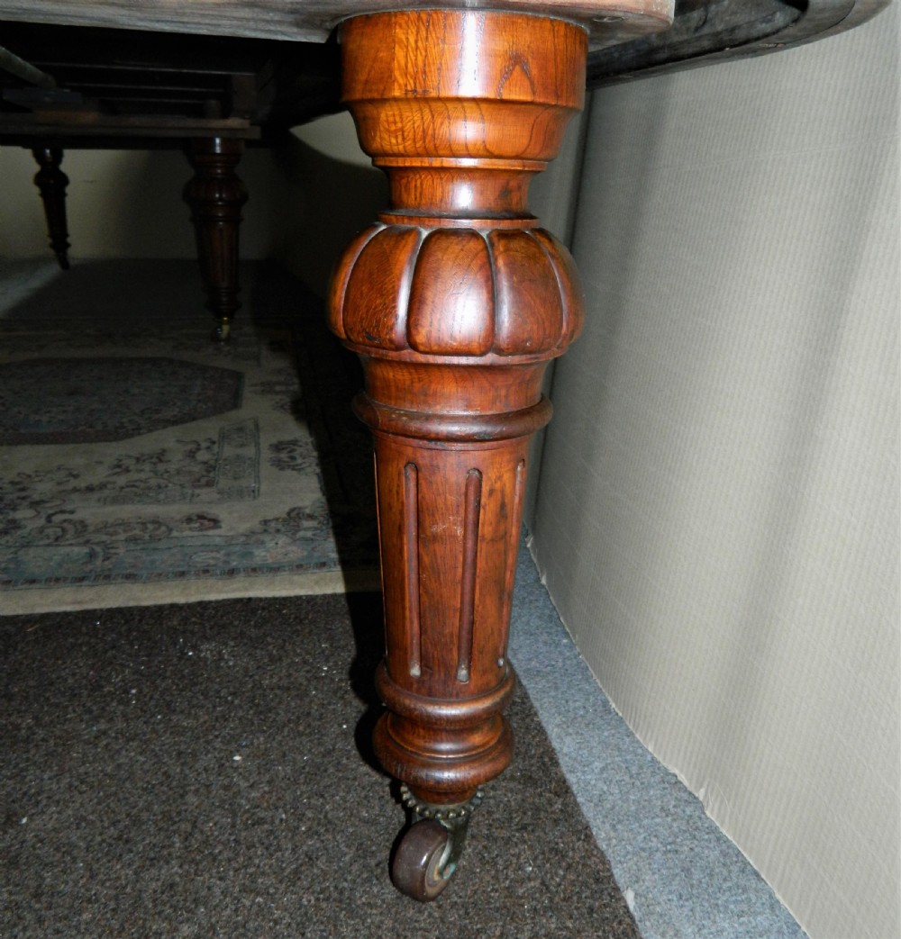 18' extending oak dining table with 7 leaves View III