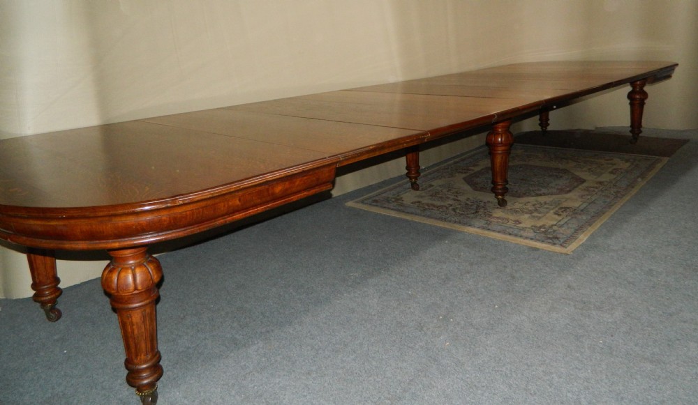 18' extending oak dining table with 7 leaves View IV
