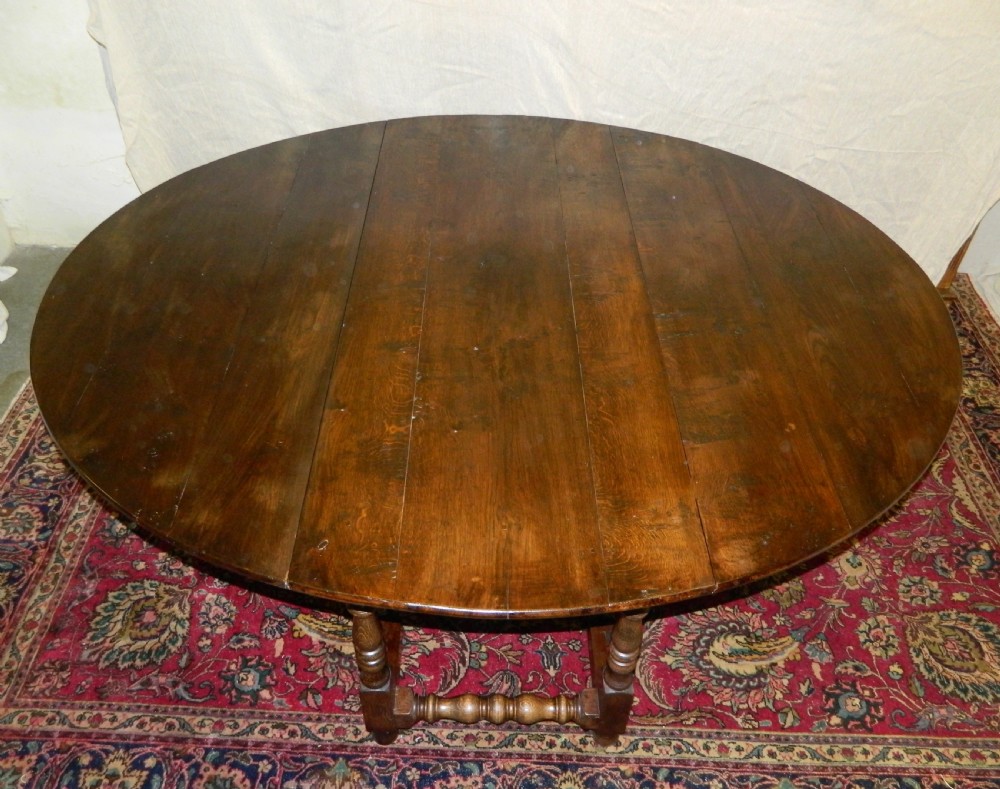 large oak double gate gateleg dining table View IV