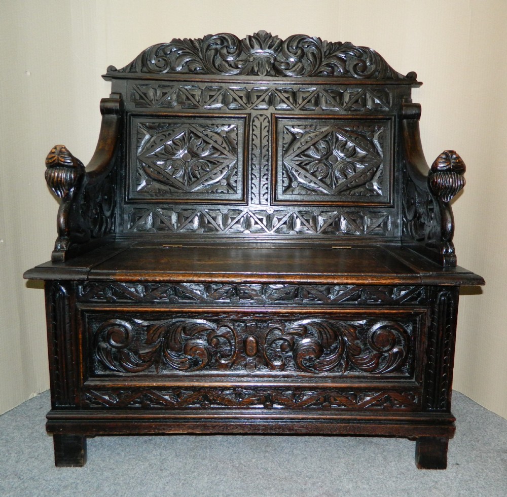 carved oak settle