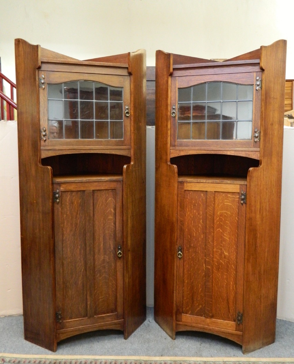 pair of oak Arts & Crafts cabinets in the manner of Liberty