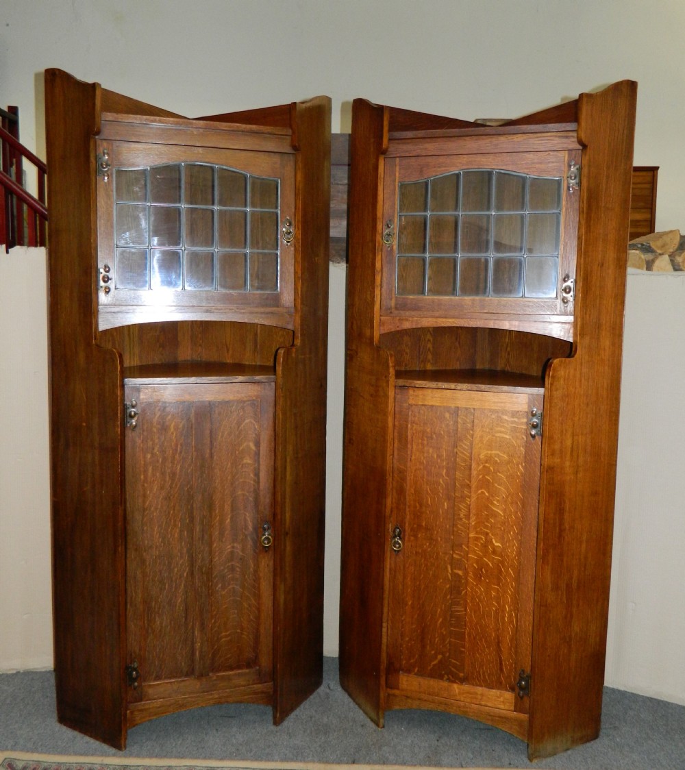 pair of oak Arts & Crafts cabinets in the manner of Liberty View VII