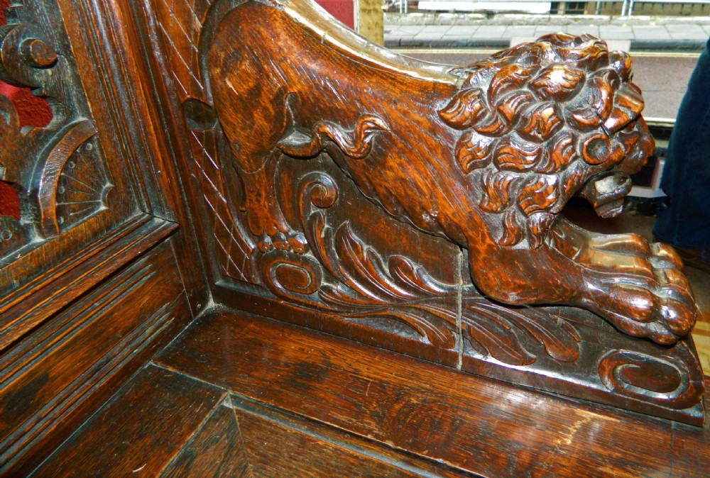 Carved oak settle View VII