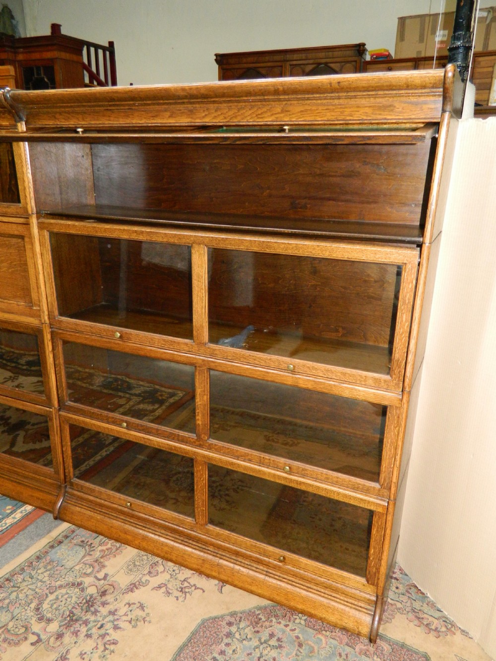suite of oak stacking bookcases View III