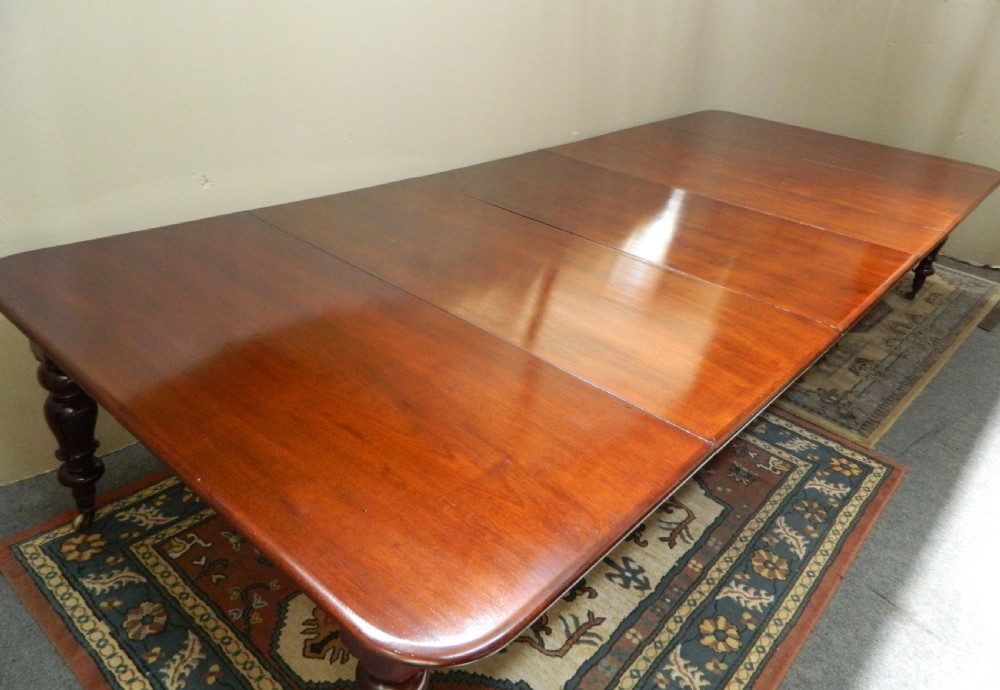large mahogany extending dining table View IV