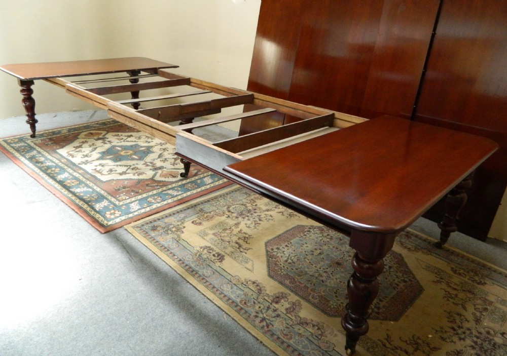 large mahogany extending dining table View VI