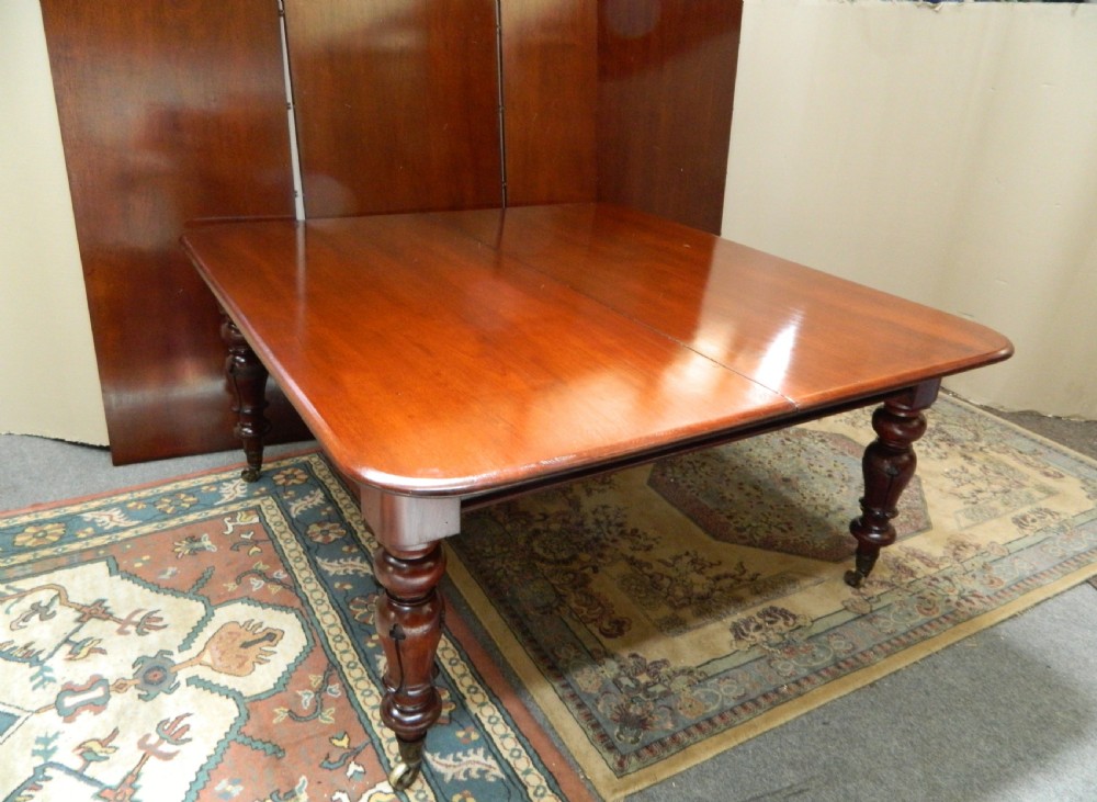 large mahogany extending dining table View VII
