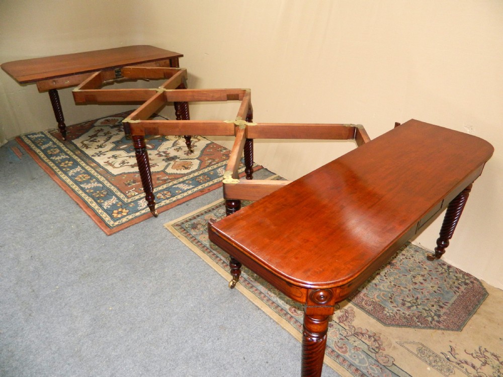 large Regency mahogany concertina action dining table  View II