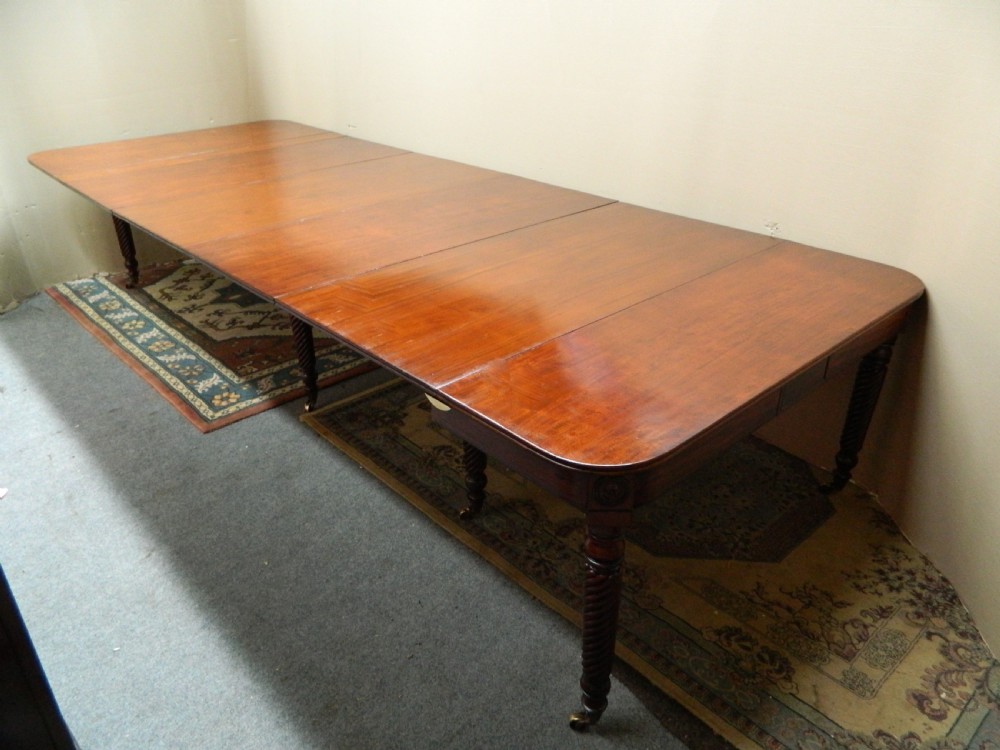 large Regency mahogany concertina action dining table  View III