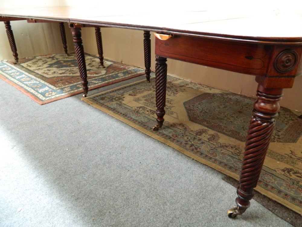 large Regency mahogany concertina action dining table  View IV