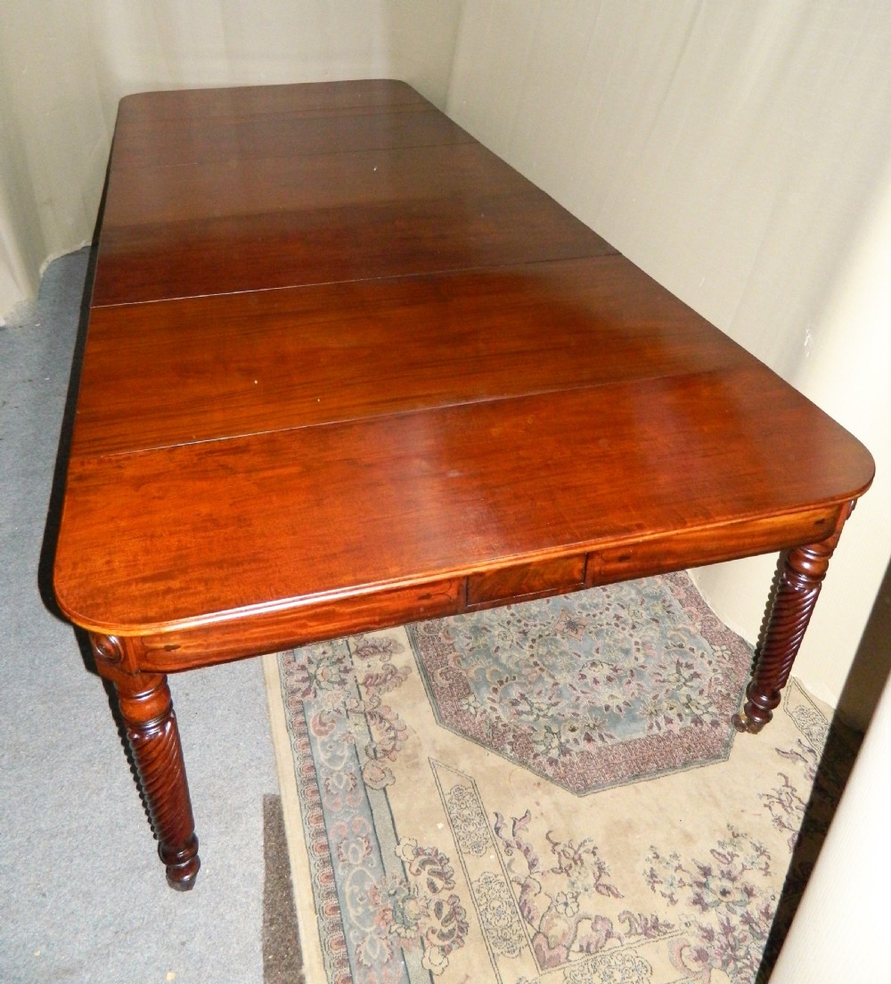 large Regency mahogany concertina action dining table  View V