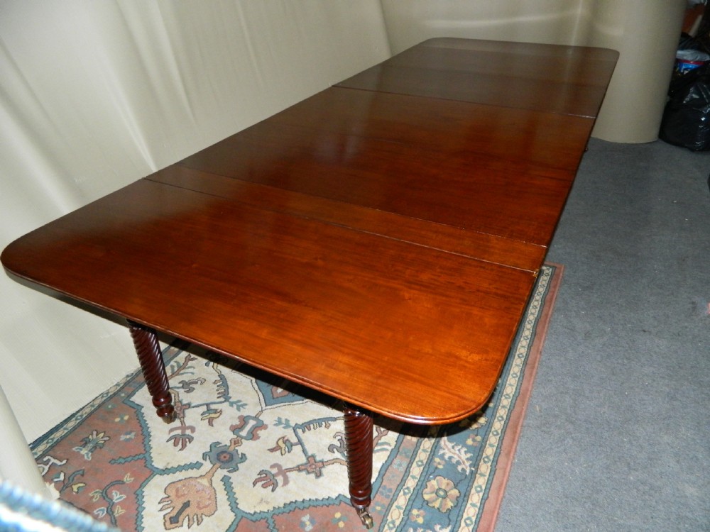 large Regency mahogany concertina action dining table  View VI