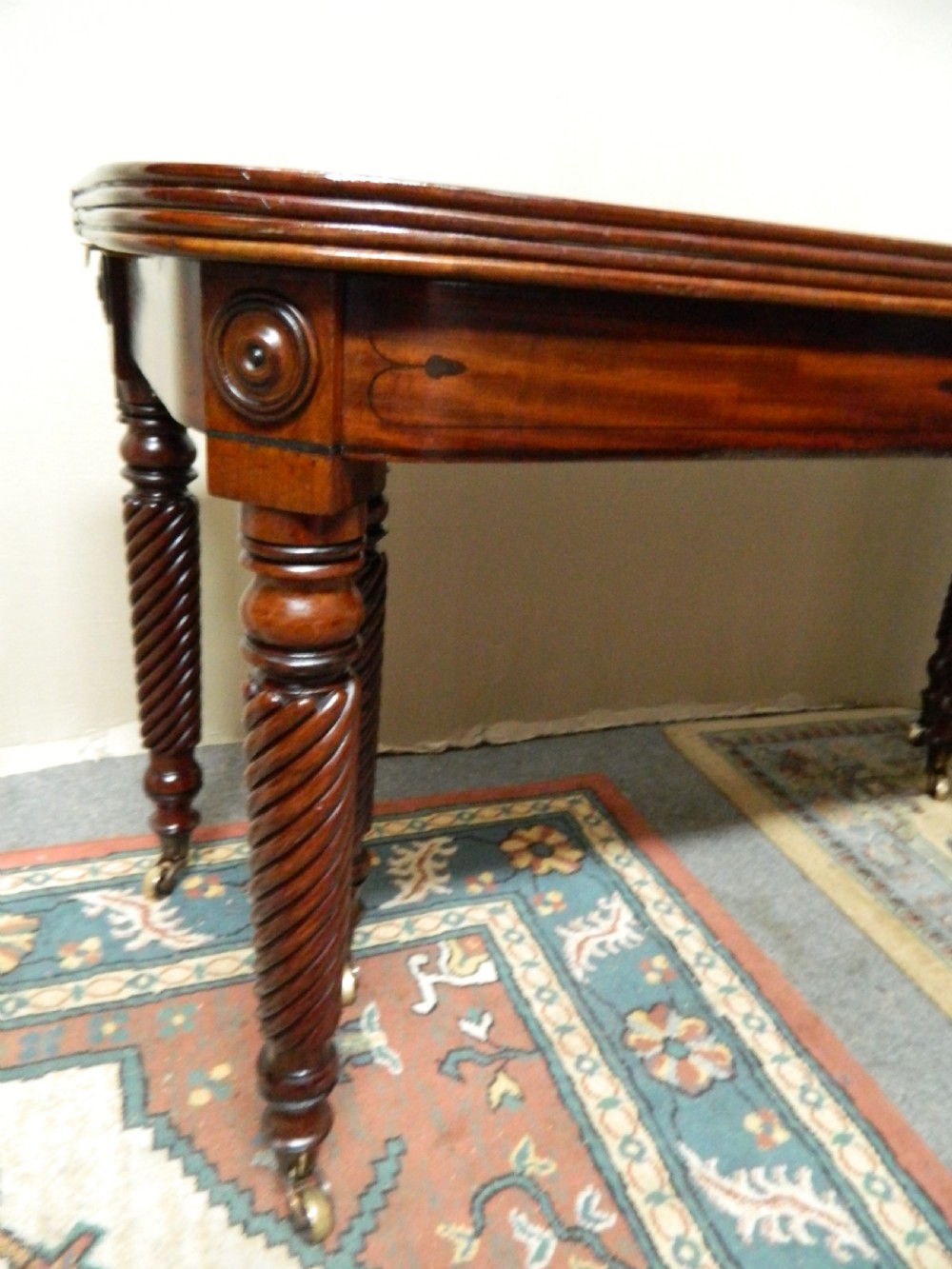 large Regency mahogany concertina action dining table  View VIII
