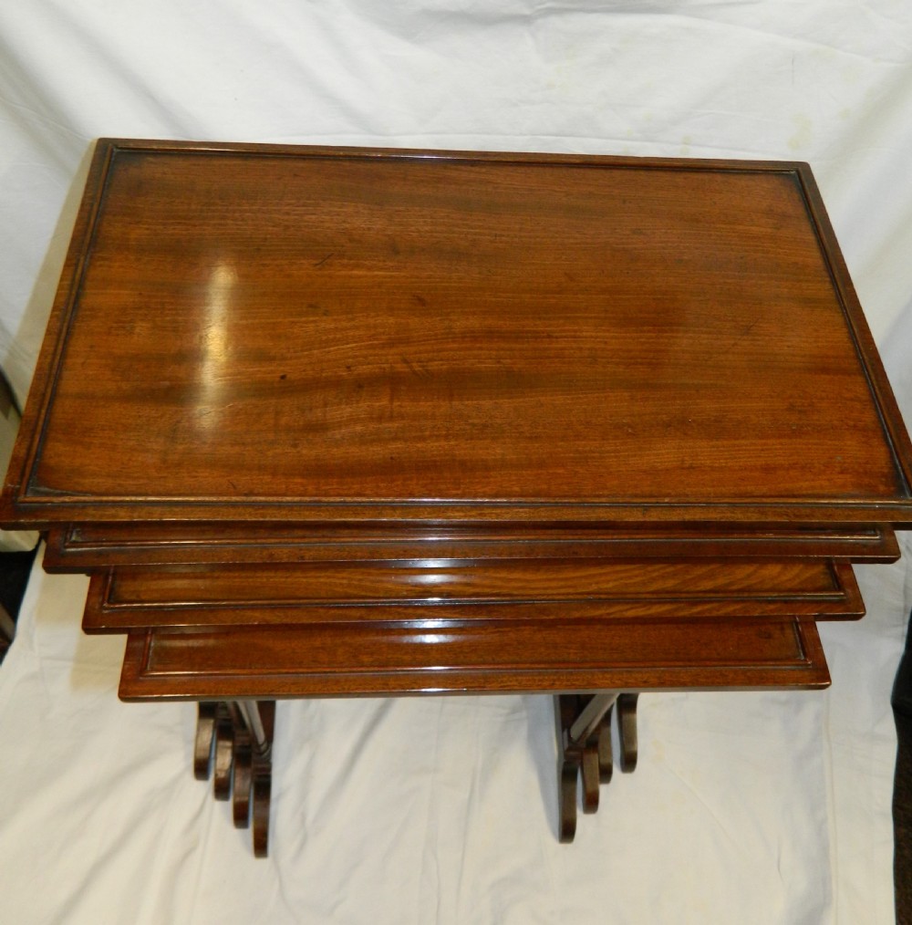 nest of four mahogany tables View III