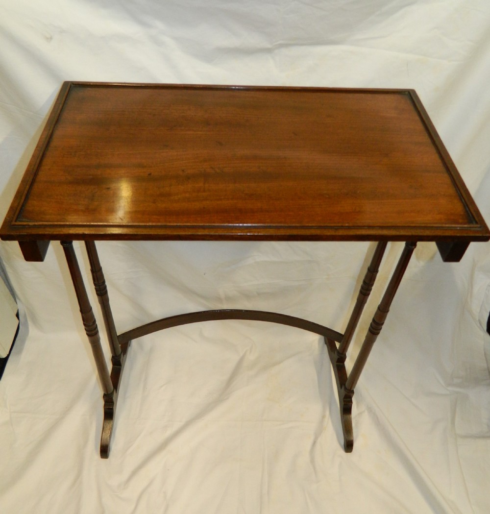 nest of four mahogany tables View IV