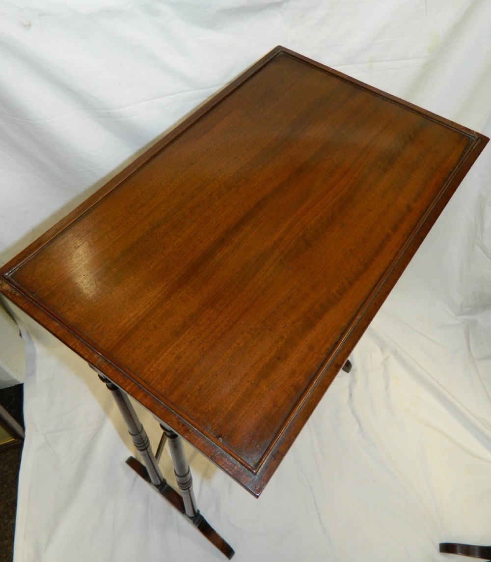 nest of four mahogany tables View V