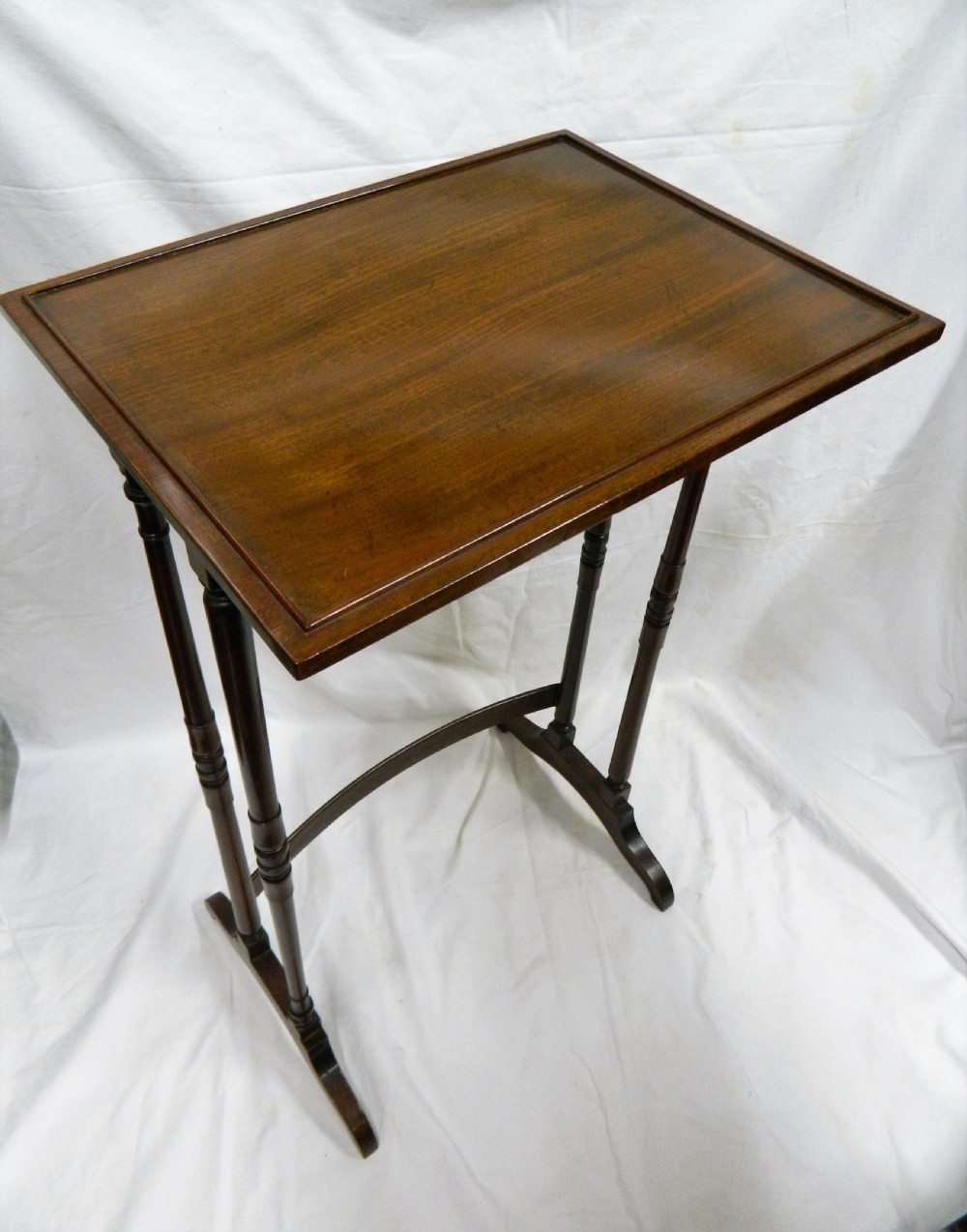 nest of four mahogany tables View VII