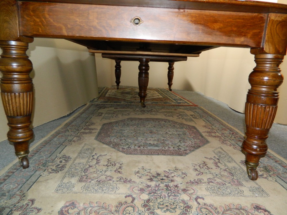extending oak dining table with 4 leaves View VI