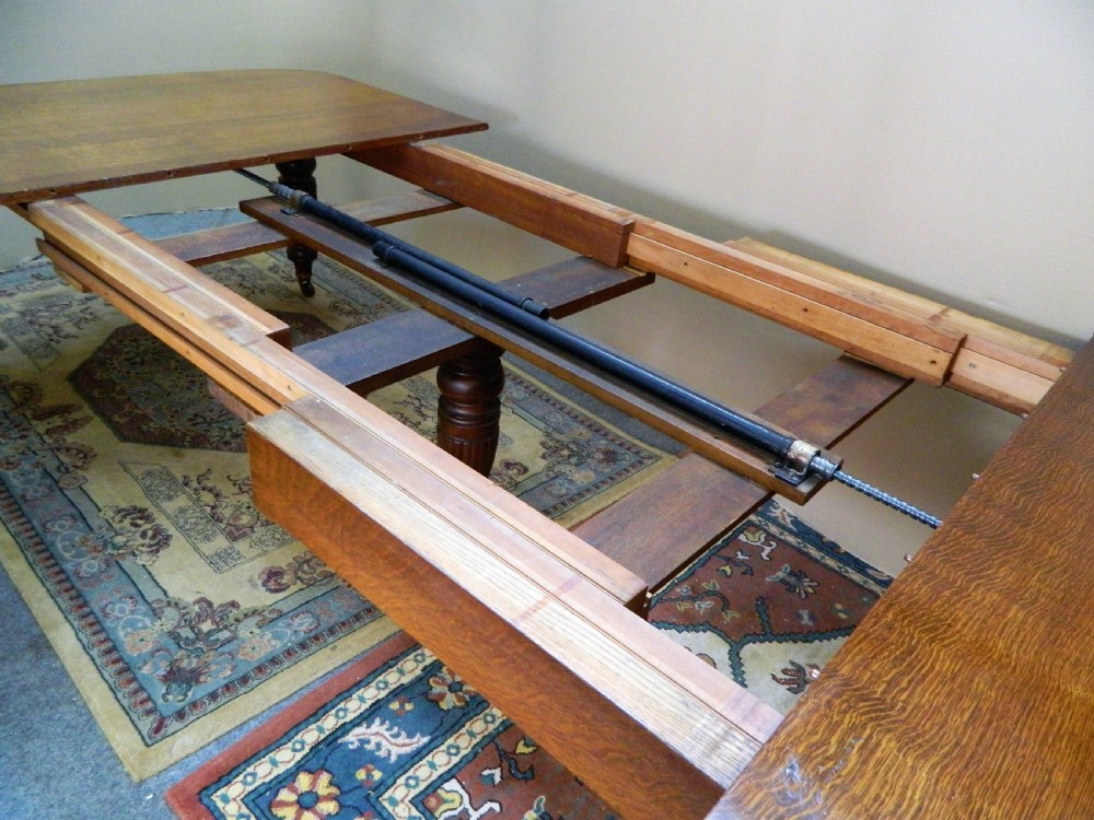 extending oak dining table with 4 leaves View VIII