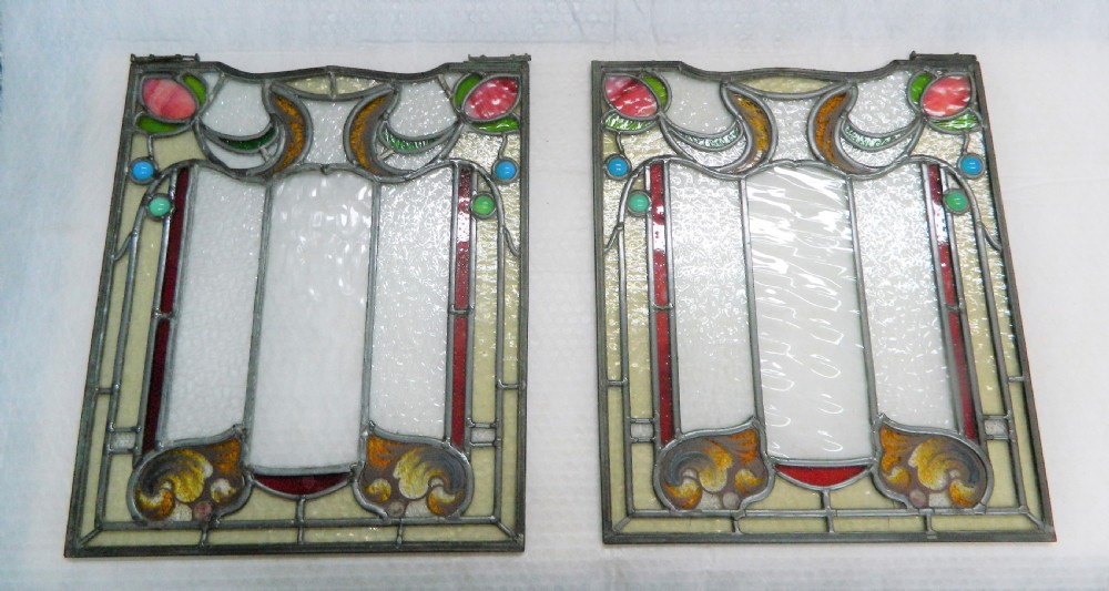 Pair of stained glass window panels