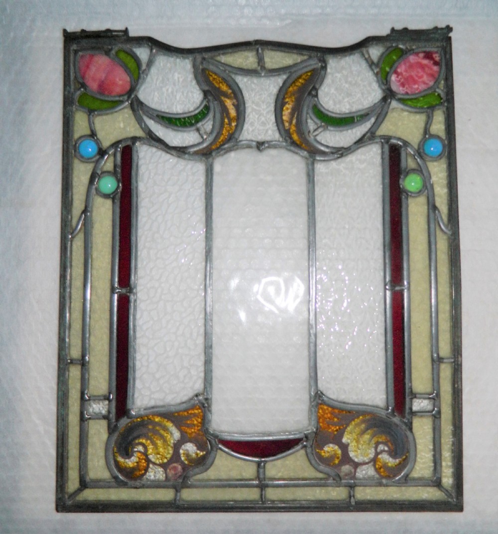 Pair of stained glass window panels View II