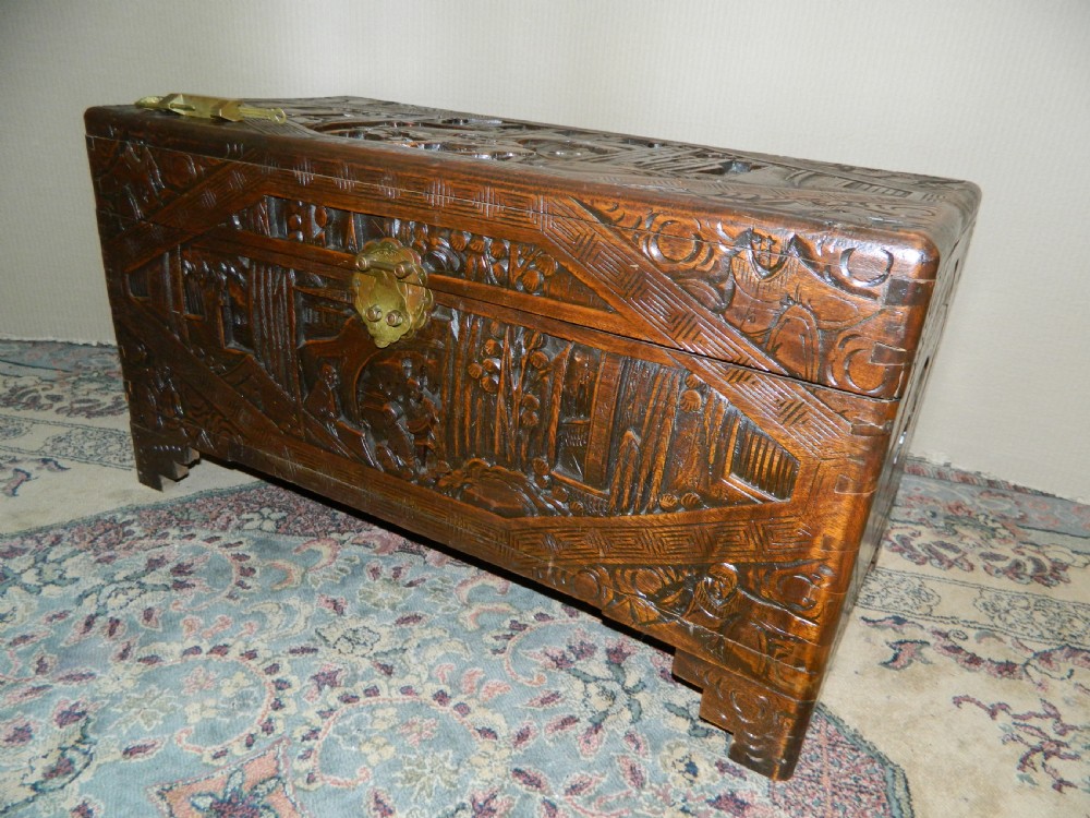 Oriental carved camphor wood trunk