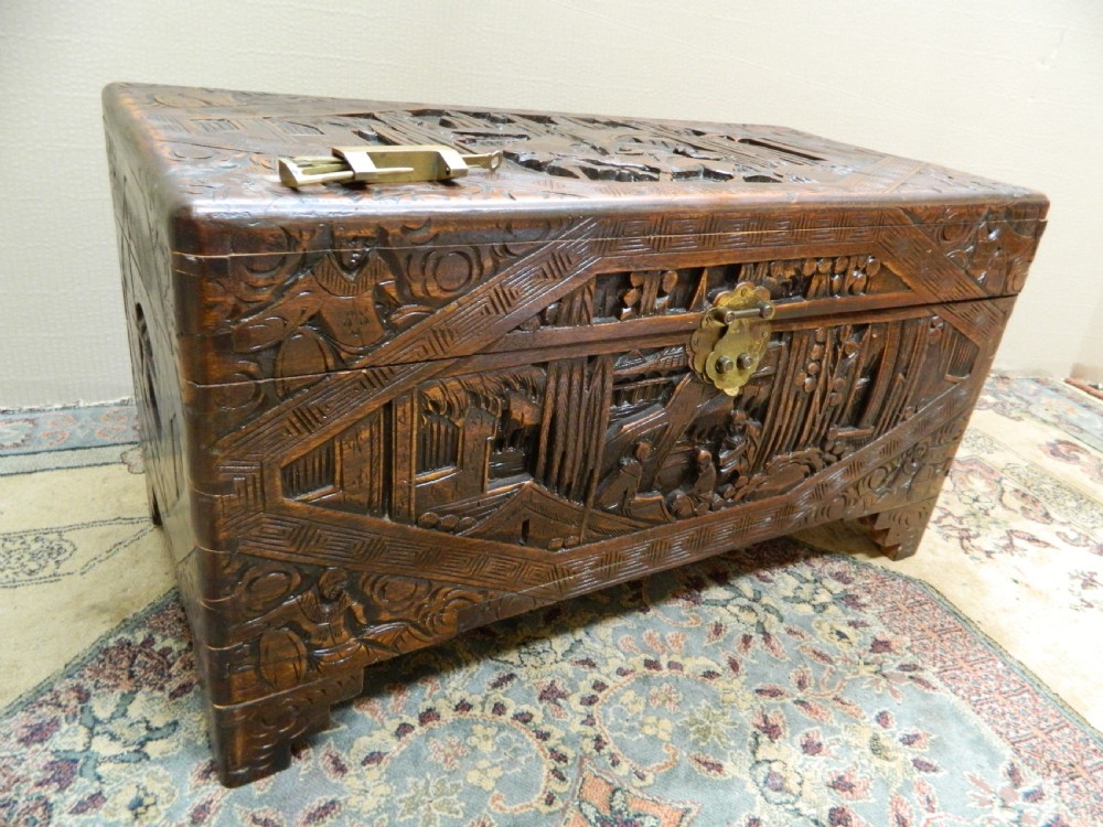 Oriental carved camphor wood trunk View II