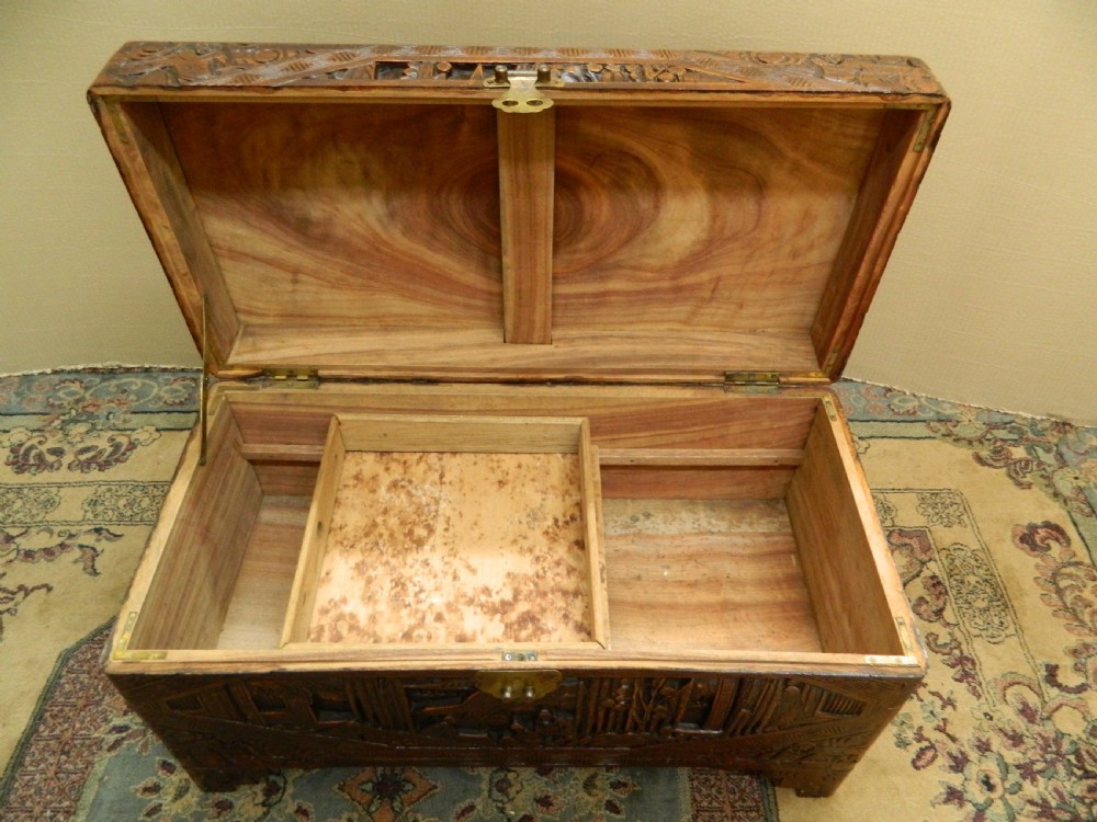Oriental carved camphor wood trunk View V