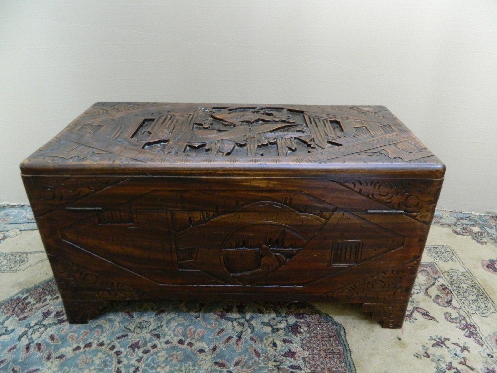 Oriental carved camphor wood trunk View VI