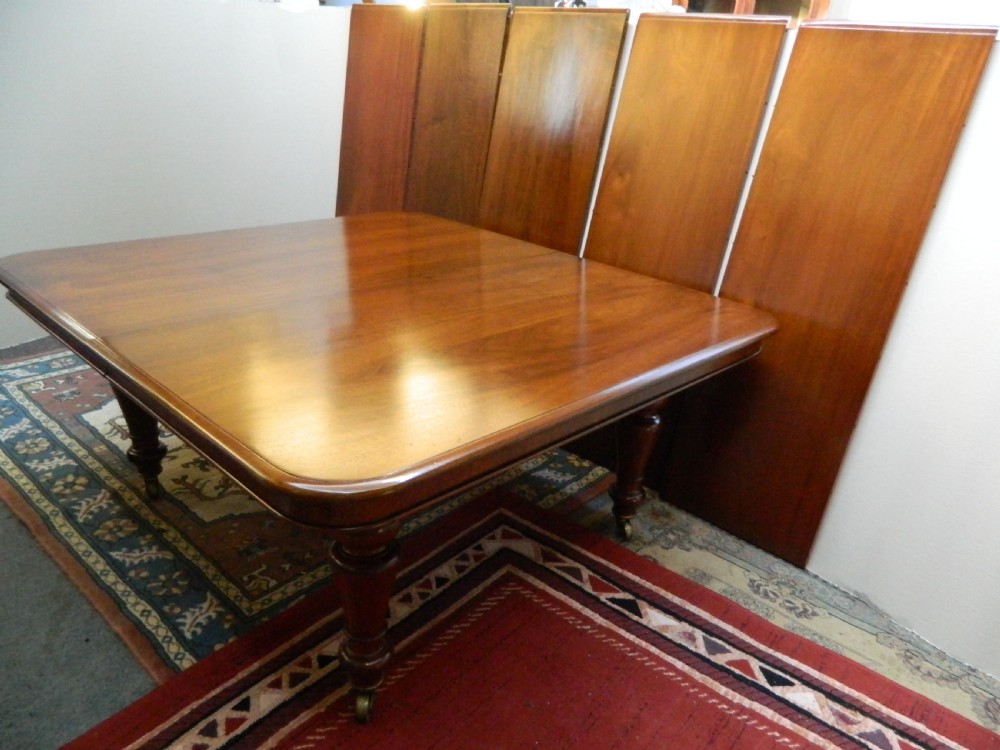 Large mahogany dining table with leaf carrier View V