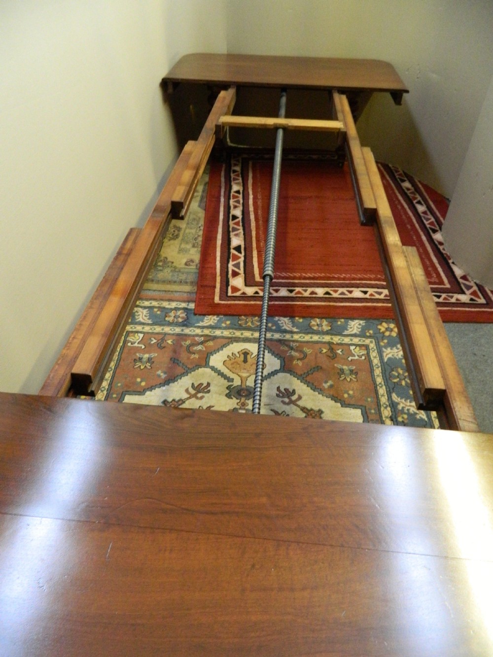 Large mahogany dining table with leaf carrier View IX