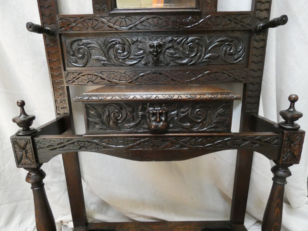 Carved oak green man hall stand View VI