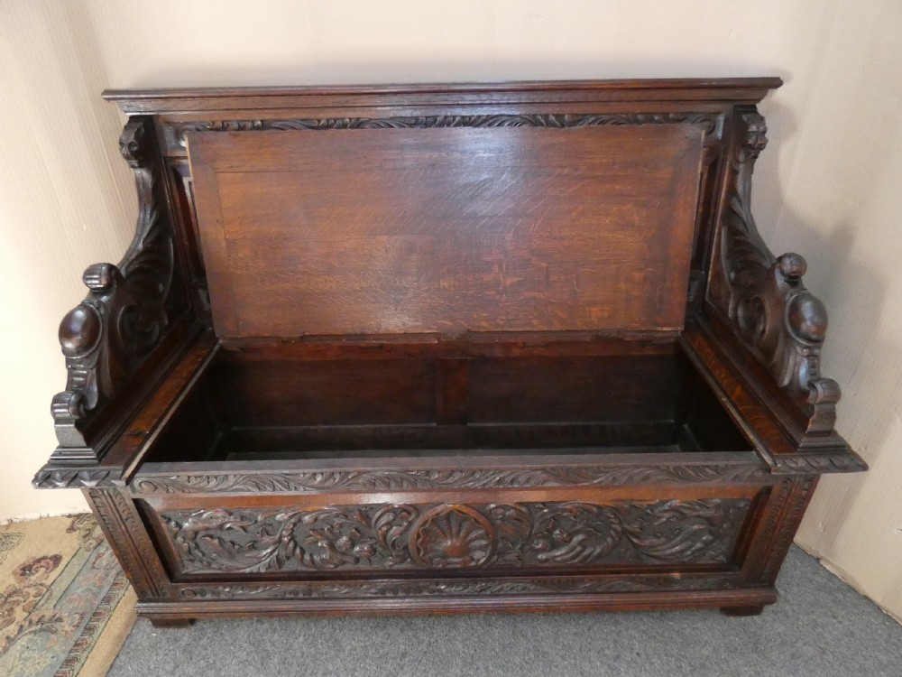 carved oak settle View VIII