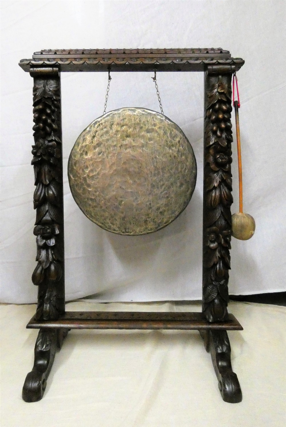 Carved oak dinner gong