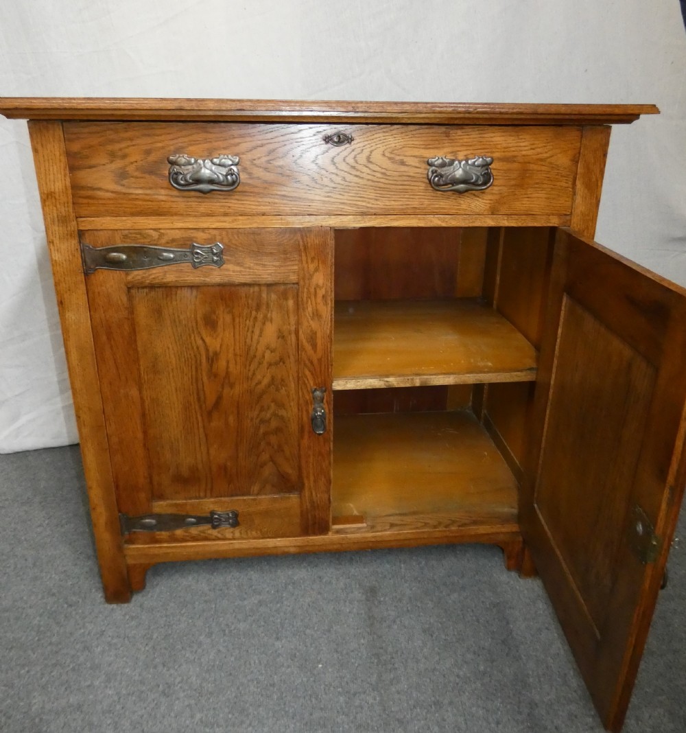 Arts & Crafts oak cupboard View IV