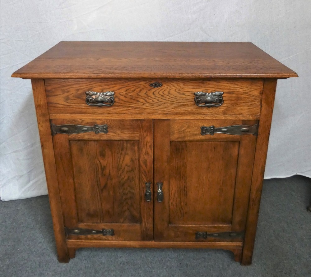 Arts & Crafts oak cupboard View VI