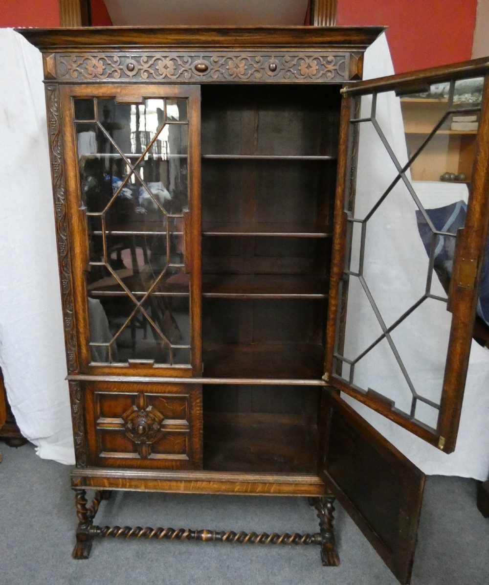 Tall oak cabinet bookcase View VII