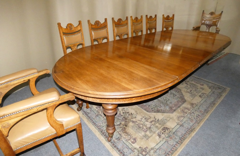 12ft extending oak dining table with 4 leaves View IV