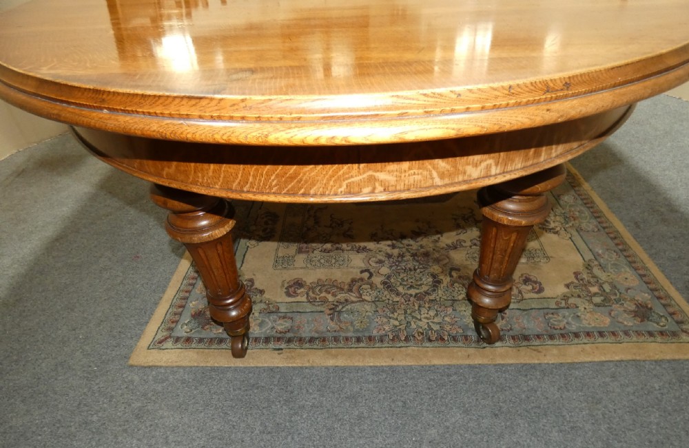 12ft extending oak dining table with 4 leaves View II