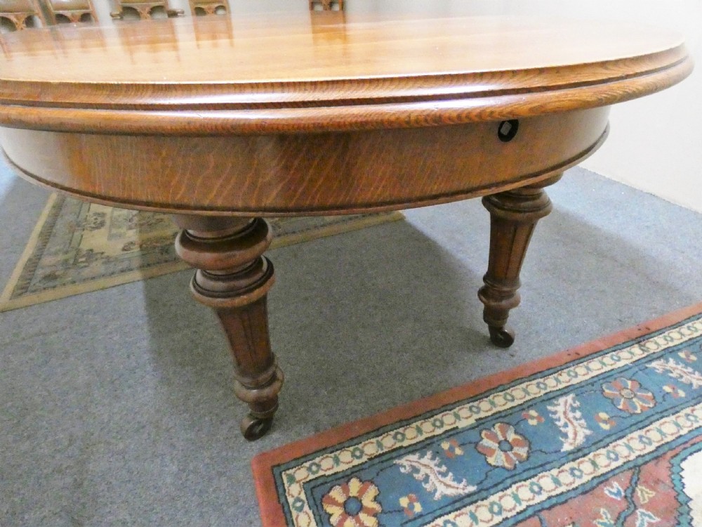 12ft extending oak dining table with 4 leaves View VI