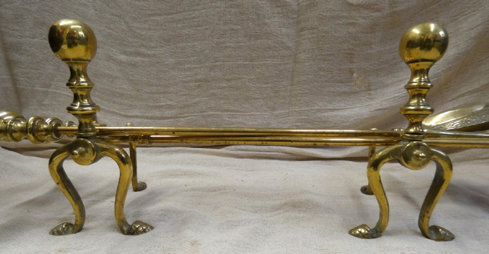 Brass andirons with set of fire tools View III