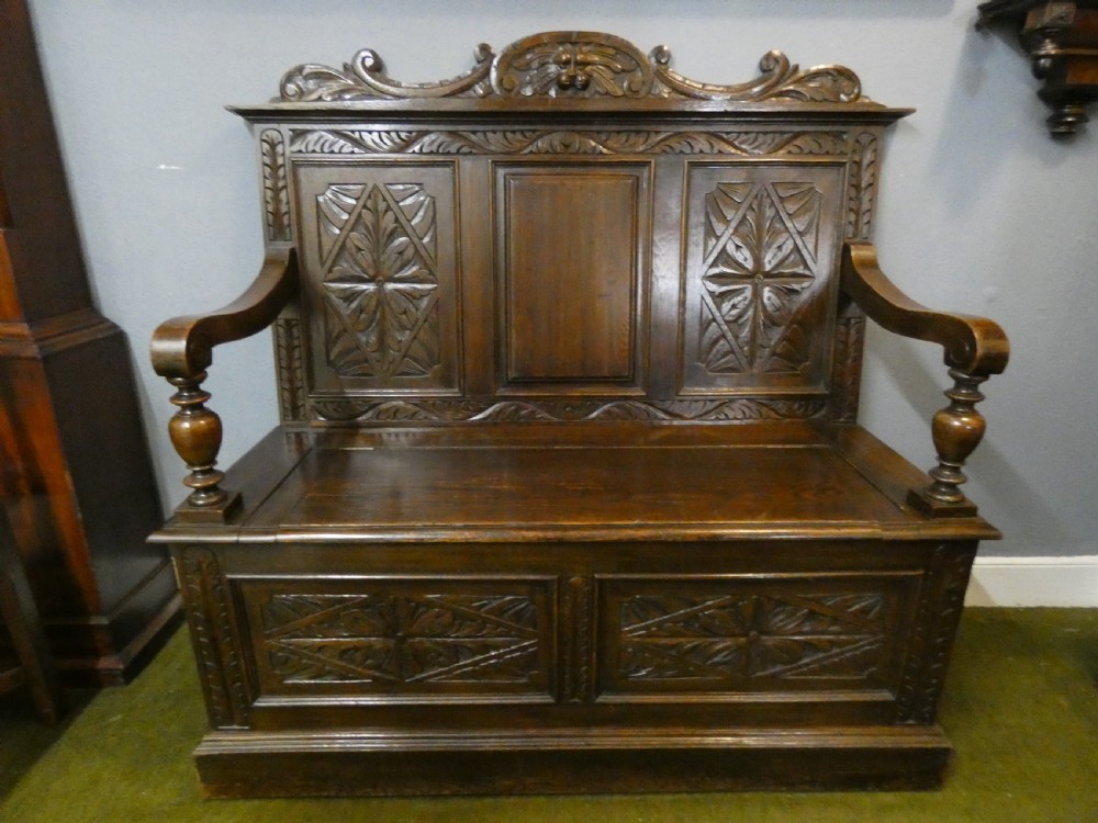 Green Man carved oak settle