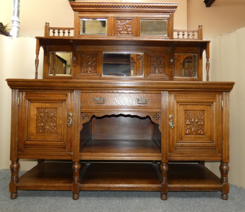 Carved oak mirror back sideboard
