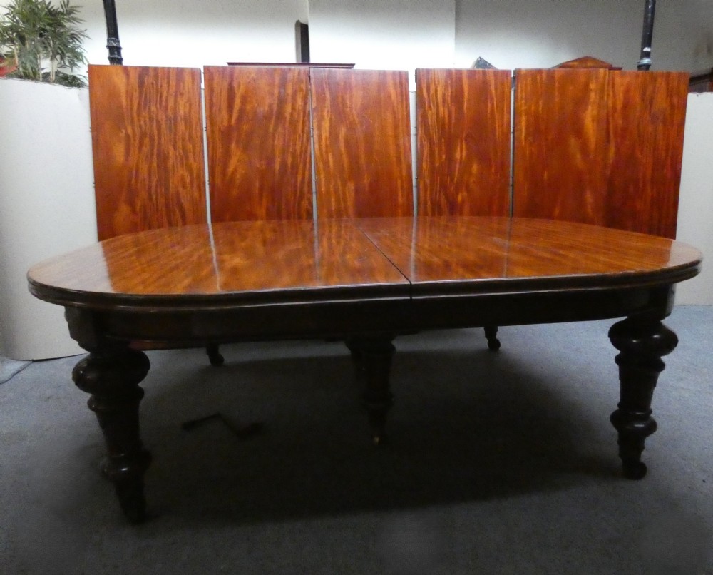 19' mahogany dining table with 6 leaves & leaf carrier